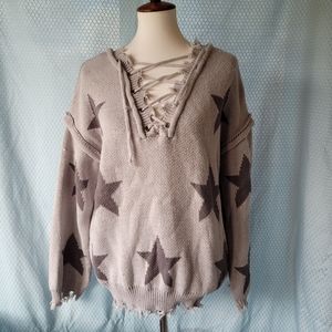 POL | Lace up star raw hem sweater